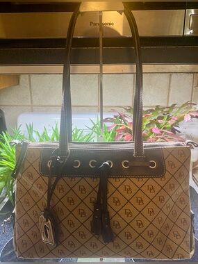 Dooney & Bourke Signature Tassel Shoulder Tote, iconic "DB" monogram pattern